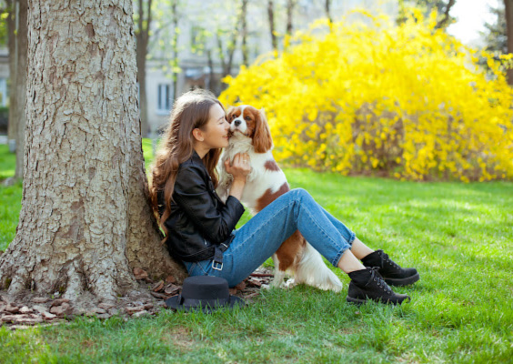 girl-enjoying-backyard-with-dog